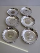 4 sterling silver dishes with coins to base, marked sterling Hong Kong & 2 silver coloured metal