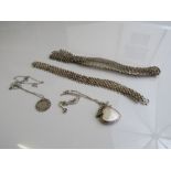 Silver locket on a silver coloured necklace; silver Victorian threepenny bit on silver