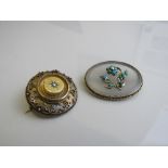 Antique gold coloured metal circular brooch with central diamond & another antique gold coloured