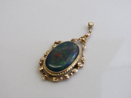 Dark green opal set in gold coloured pendant, weight 4.9gms. Estimate £800-1,000