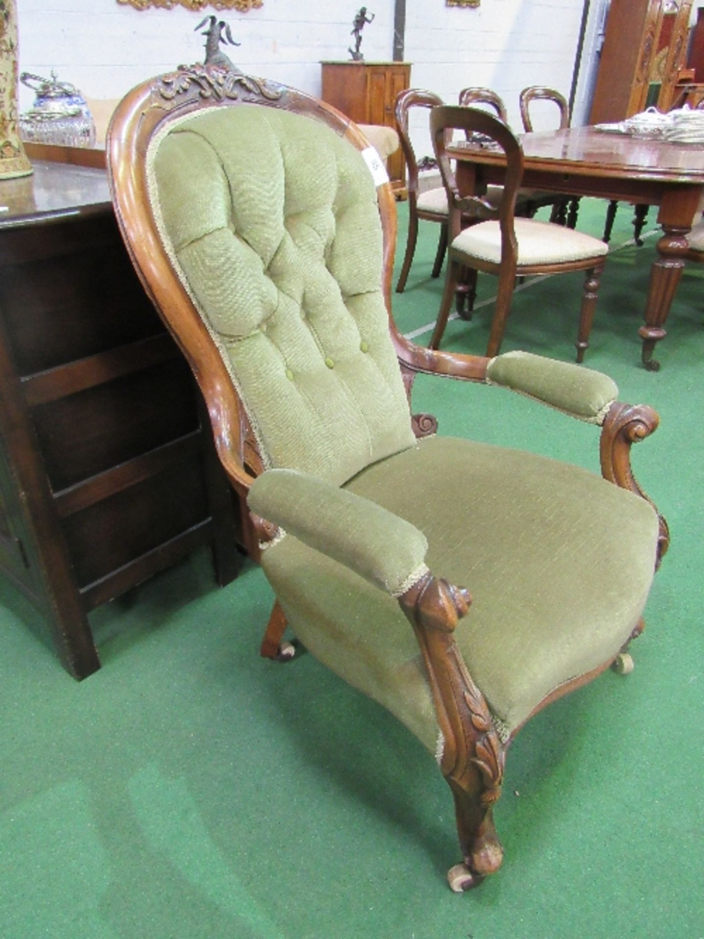 Victorian mahogany carved framed upholstered open armchair with spoon back on casters. Estimate £ - Image 2 of 3