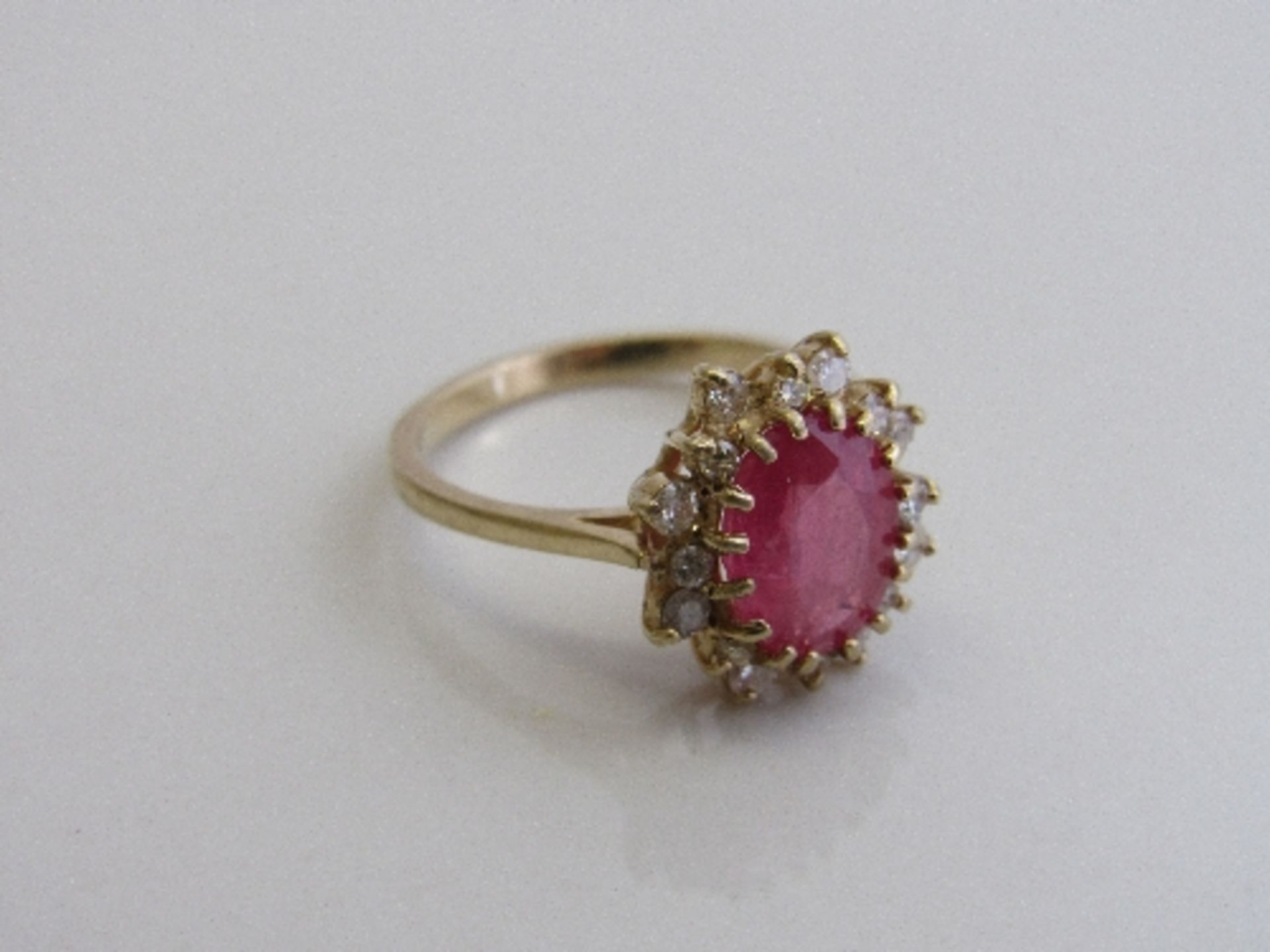 9ct gold, ruby & diamond ring, size Q, weight 3.6gms. Estimate £250-300