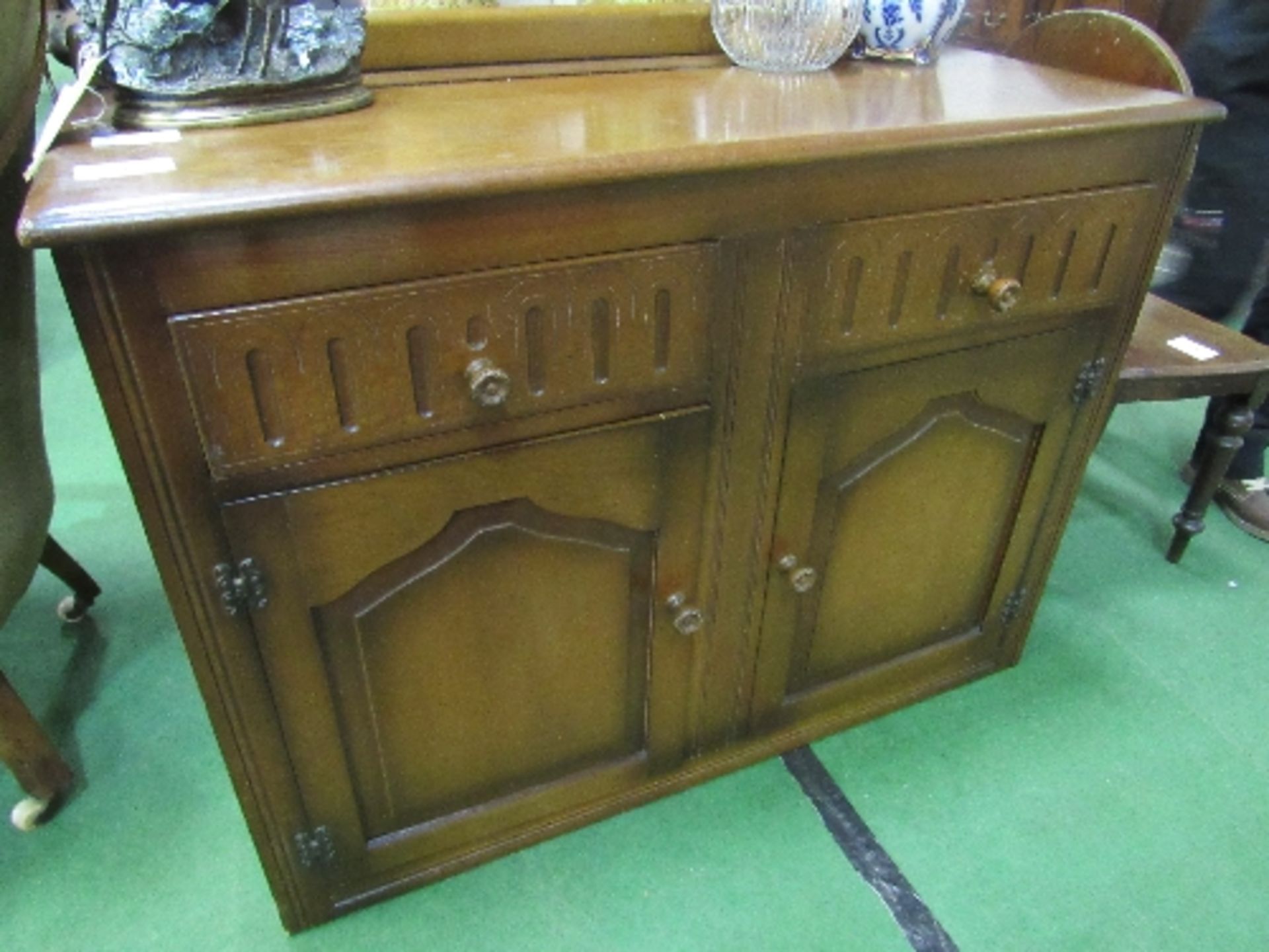 Oak sideboard by H W Smith, Cabinet Makers of High Wycombe, 110cms x 44cms x 85cms. Estimate £20-30