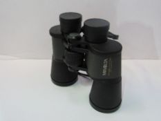 A pair of Minolta binoculars. Estimate £20-30