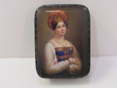 Lacquered box with a portrait of a Russian lady on the lid. Estimate £20-30