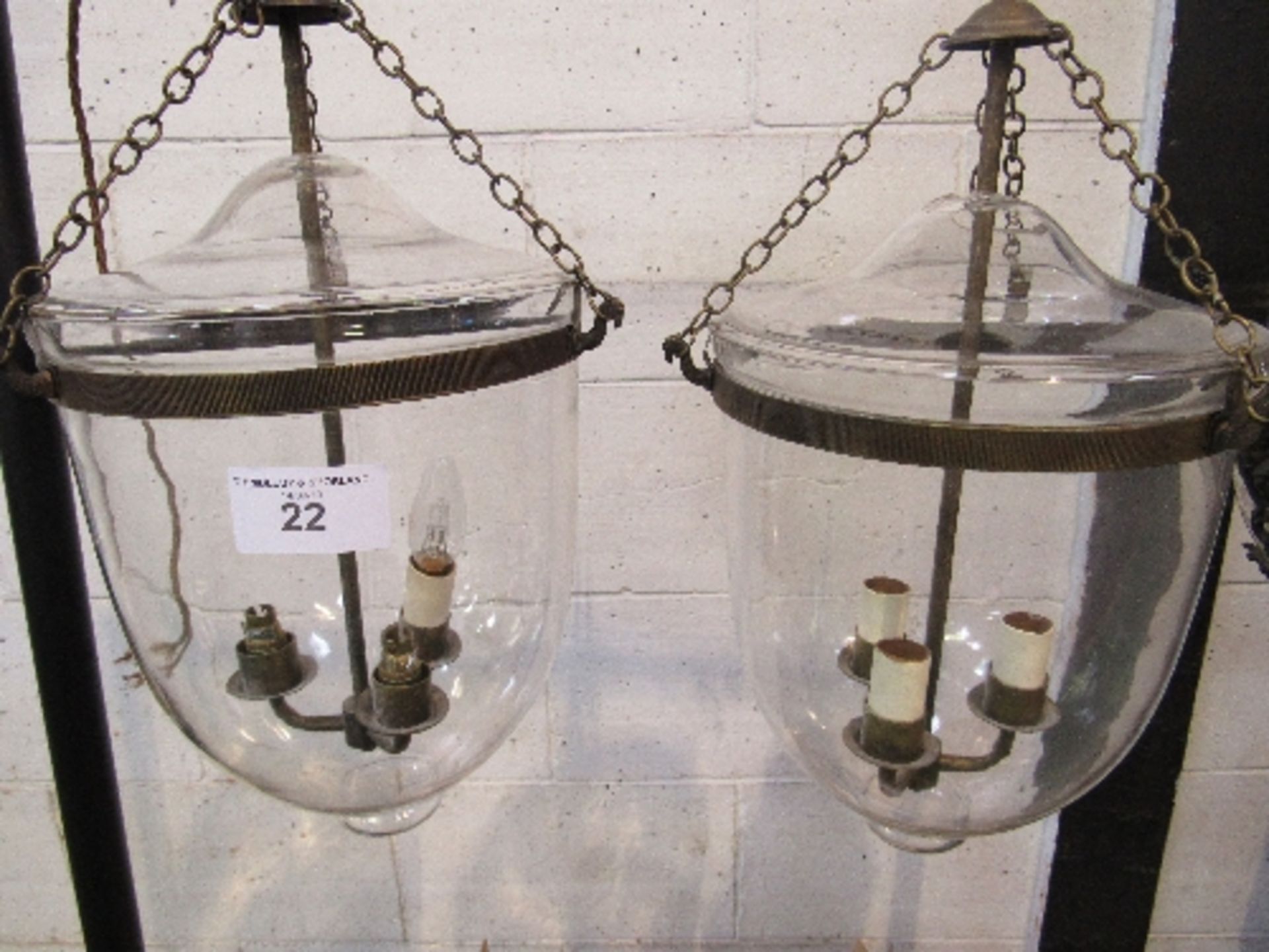 Pair of glass & brass Temple lanterns from Hector Finch. Estimate £20-40