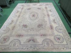 Fawn ground carpet, 310 x 225. Estimate £30-50