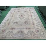 Fawn ground carpet, 310 x 225. Estimate £30-50