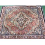 Red & pink ground rug with medallion, 170 x 130. Estimate £20-30