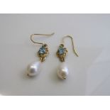 Blue Zircon & seed pearl drop earrings. Estimate £250-280