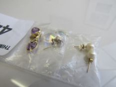 3 pairs of 9ct gold earrings. Estimate £30-50