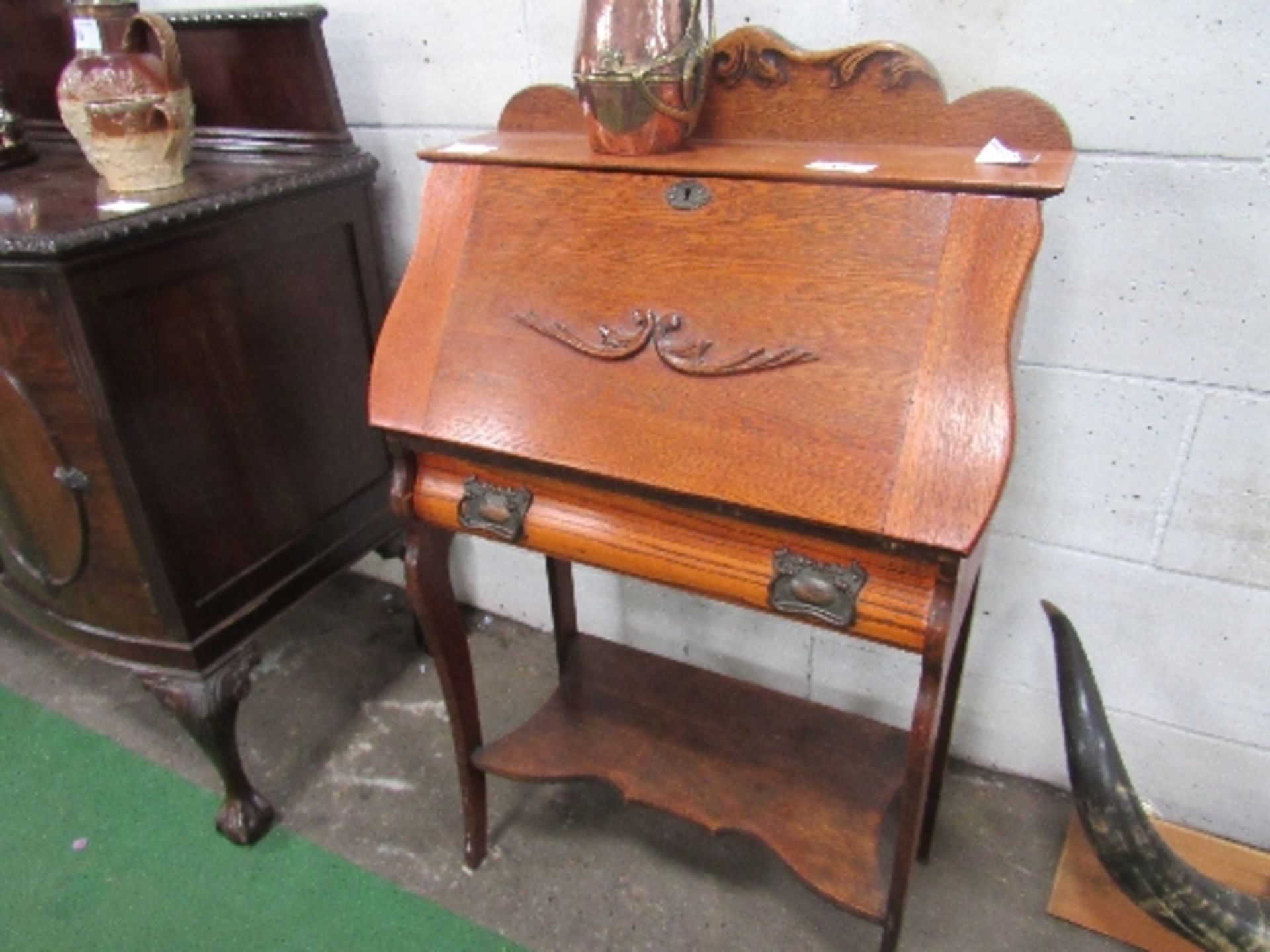 Oak Arts & Crafts style bureau with frieze drawer & shaped shelf to base, 70cms x 35cms x 107cms.