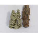 2 oriental stone carved figurines: 1 of an old gentleman & the other a group of monkeys;