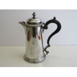 Silver coffee pot with wooden handle, Sheffield 1929, total weight 14oz, height 21cms. Estimate £
