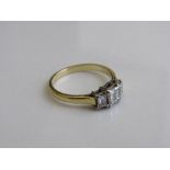 18ct gold & platinum Art Deco-style ring with 3 baguette cut diamonds, size N 1/2, weight 3.3gms.