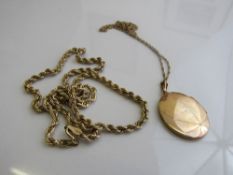 9ct gold locket on a fine gold coloured chain, locket weight 5.3gms & a 9ct gold necklace weight 4.