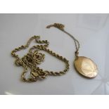 9ct gold locket on a fine gold coloured chain, locket weight 5.3gms & a 9ct gold necklace weight 4.