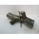 Large silvered model brass log with cross-cut saw, being the first prize award for log sawing at the