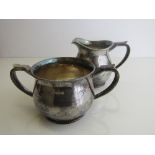 Hallmarked silver milk jug & sugar bowl, London 1998, by Guild of Handicraft, total weight 22oz.