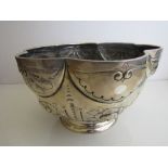 Heavily decorated punch bowl with scalloped rim, new hallmarks, height 13cms, diameter 23cms, weight
