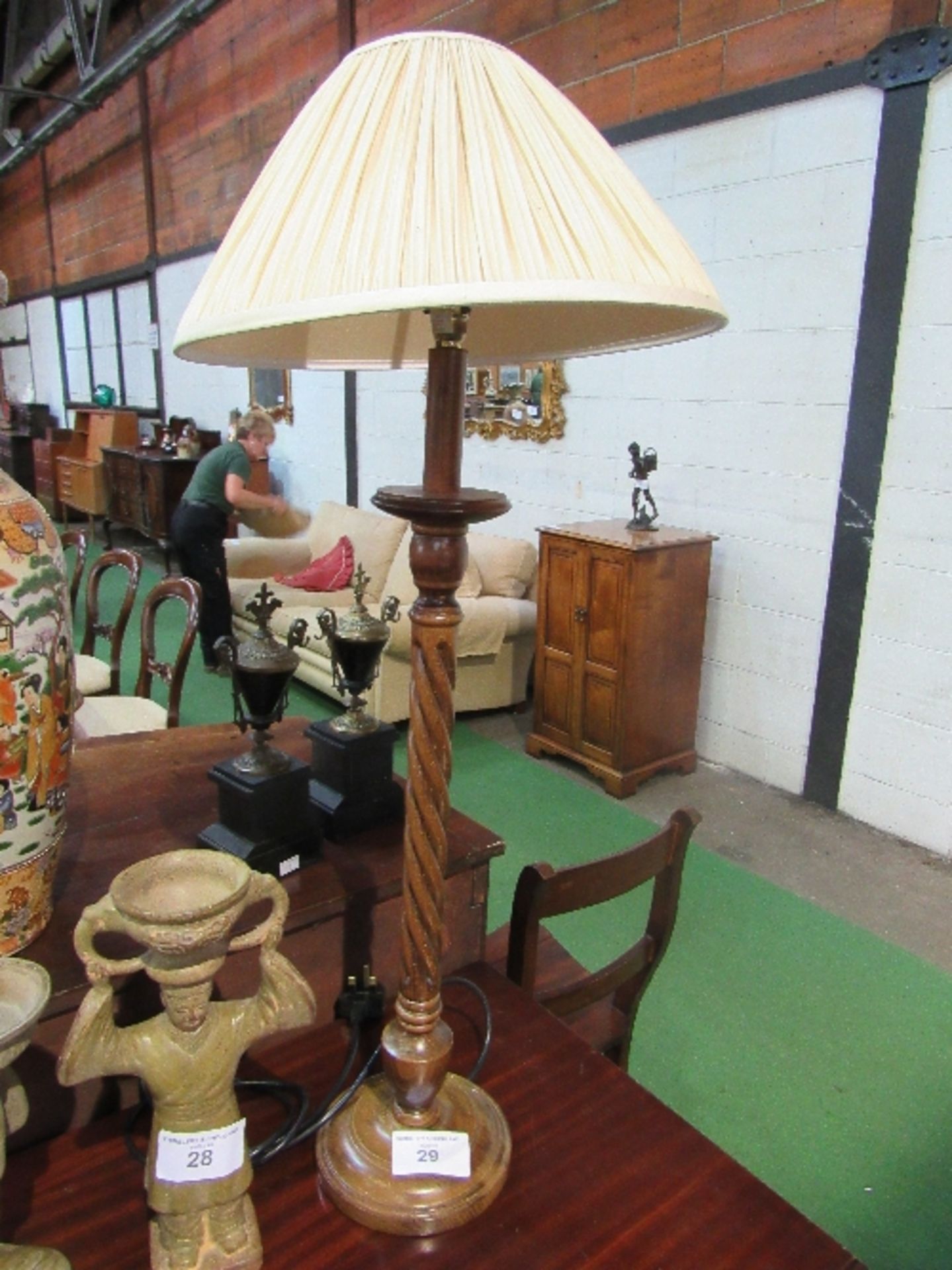 A pair of twisted bine tall candlesticks, height 66cms. Estimate £30-40