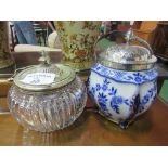 Glass biscuit barrel & a blue & white Doulton 'The Duchess' biscuit barrel. Estimate £20-30