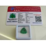 Natural trillion cut loose emerald, 6.9ct with certificate. Estimate £50-70