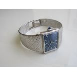 Rotary black rectangular face lady's wrist watch with integral strap, going. Estimate £20-40