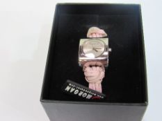 'Morgan de Toi' lady's wristwatch, going with certificates, new, in box. Estimate £15-25