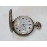 Silver hallmarked half hunter watch, Roman numerals, second hand, by Thomas Russell & Son,
