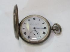 Silver hallmarked half hunter watch, Roman numerals, second hand, by Thomas Russell & Son,