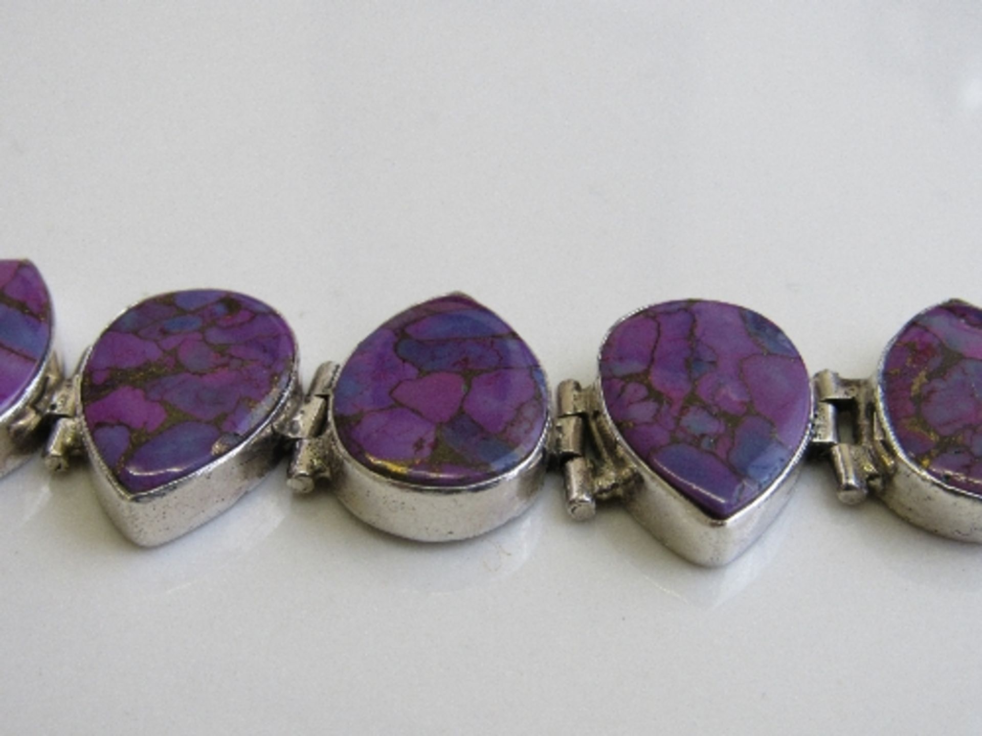 Silver hallmarked bracelet with tear drop purple stones. Estimate £20-30 - Image 2 of 3