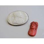 Cameo brooch of a classical gentleman together with a cameo-type lady's bust without a frame.