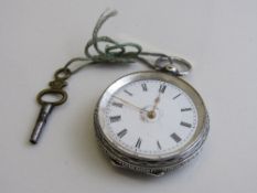 935 silver pocket watch with key. Estimate £20-30