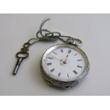 935 silver pocket watch with key. Estimate £20-30