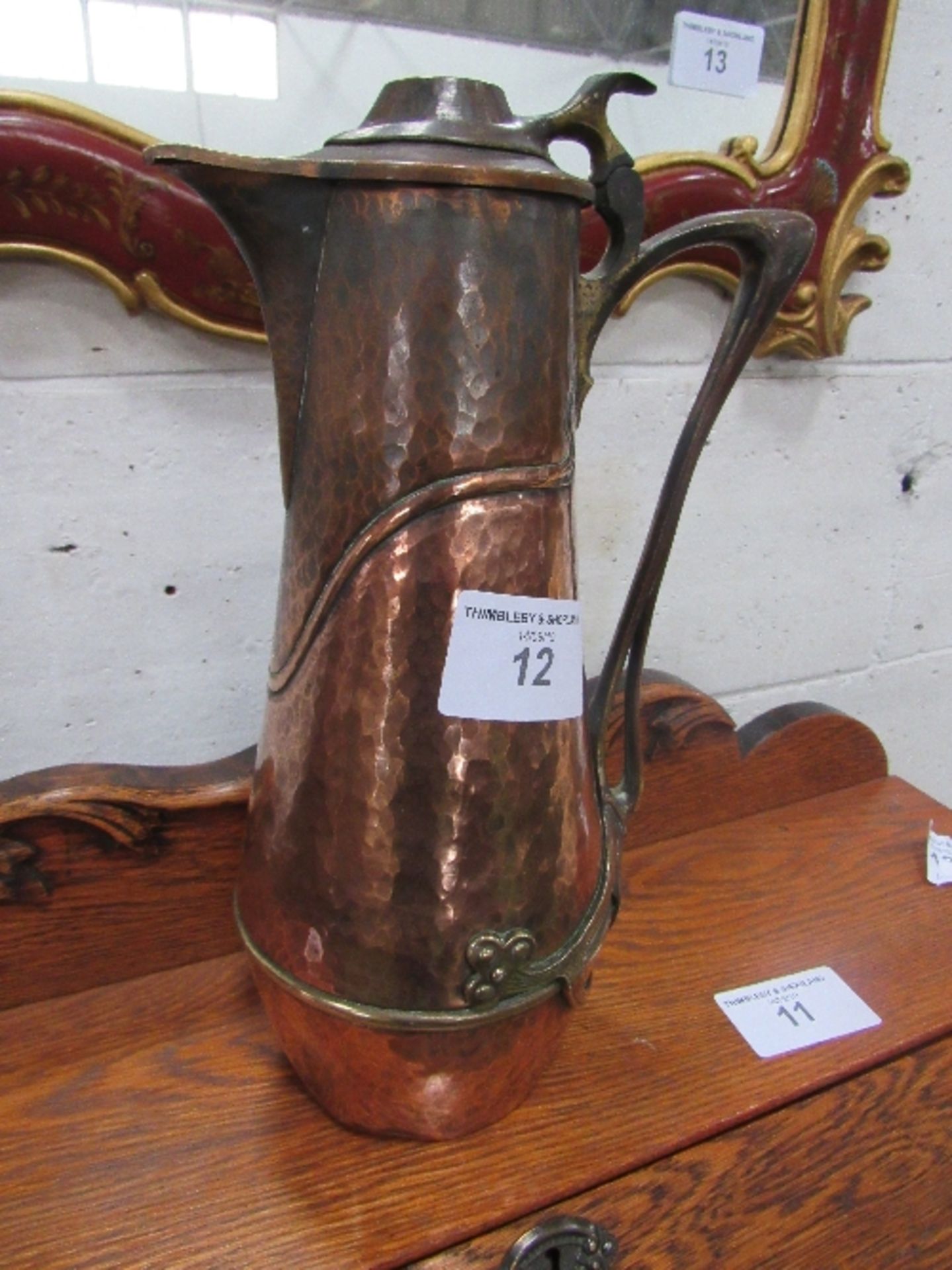 WMF Art Nouveau style copper & brass lid jug with sparrow beak, marks to base, height 33cms.