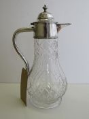 Victorian cut glass silver mounted claret jug, hallmarked London 1884, height 29cms. Estimate £80-