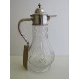 Victorian cut glass silver mounted claret jug, hallmarked London 1884, height 29cms. Estimate £80-