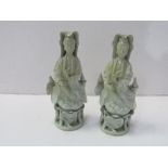A pair of celadon female figurines, a/f, height 14cms.