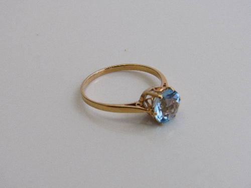 Yellow metal topaz ring, size S, weight 1.9gms. Estimate £50-80