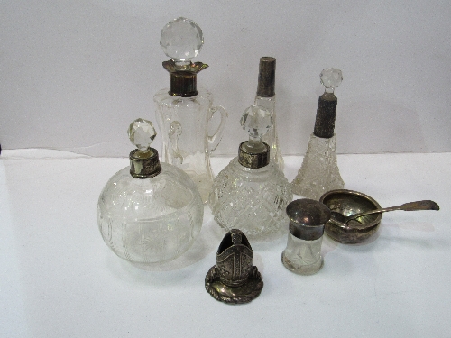 4 silver rimmed cut glass perfume bottles; a small gent's 3 handled decanter; a small perfume bottle