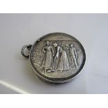 Circular silver vesta case, Birmingham 1906, decorated with Edwardian figures playing croquet,