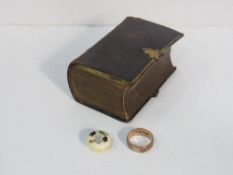 Gold coloured band, miniature leather bound prayer book, 1846 & an ivory button set with coloured