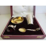 Asprey silver christening set, hallmarked London, 1991 & 1992: bowl, cup, napkin ring & spoon. All