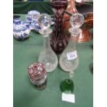 2 cut glass decanters; ruby cut to clear vase, height 34cms; glass bell & ruby red glass lidded pot