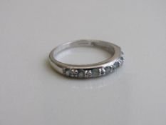 9ct white gold & pale green diamond eternity ring, size N 1/2, weight 2.1gms. Estimate £40-60