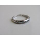 9ct white gold & pale green diamond eternity ring, size N 1/2, weight 2.1gms. Estimate £40-60