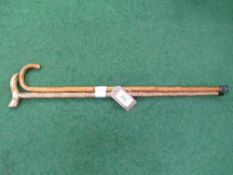 Decorative turned oak walking stick with Derby handle & a bentwood walking stick. Estimate £10-15