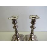 A pair of candlesticks, Sheffield 1975, height 18cms & a silver 3 branch candelabra,
