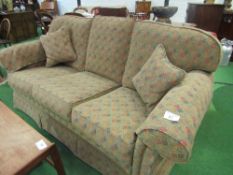 3 seater sofa by Peter Guild in harlequin pattern upholstery, 200cms x 100cms. Estimate £100-120